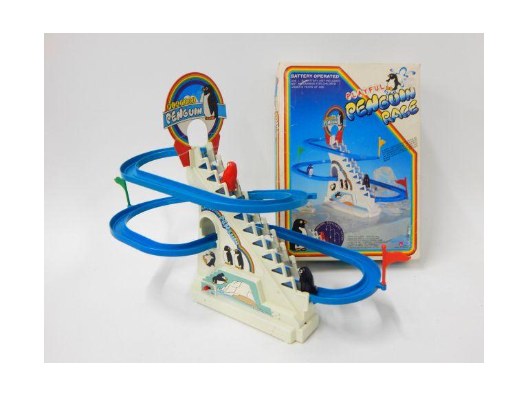 playful penguin race toy